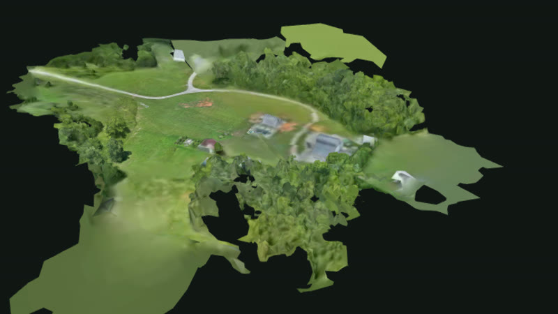 Textured 3D mesh of the property — a solid, walkable surface model